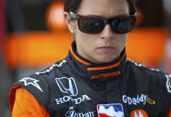 SPARTA, KY - JULY 31:  Danica Patrick driver of the #7 Boost Mobile/Motorola Andretti Green Racing Dallara Honda during a delay in practice for the IRL IndyCar Series Meijer Indy 300 on July 31, 2009 at the Kentucky Speedway in Sparta, Kentucky.  (Photo by Robert Laberge/Getty Images)