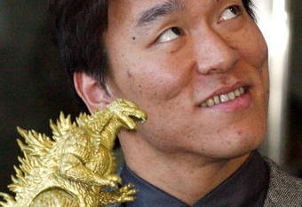CHIBA, JAPAN - FEBRUARY 3:  Baseball player Hideki Matsui holds a small gold Godzilla figure given to him for his nickname, at a news conference before he heads to New York February 3, 2003 in Chiba, Japan. The Japanese slugger signed a three-year, $21 million contract with the Yankees and will report to training camp this month.  (Photo by Junko Kimura/Getty Images)