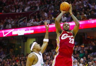 CLEVELAND - OCTOBER 27:  LeBron James #23 of the Cleveland Cavaliers shoots a jumper against Paul Pierce #34 of the Boston Celtics during the season opener at Quicken Loans Arena on October 27, 2009 in Cleveland, Ohio.  NOTE TO USER: User expressly acknowledges and agrees that, by downloading and or using this photograph, User is consenting to the terms and conditions of the Getty Images License Agreement. (Photo by Gregory Shamus/Getty Images)