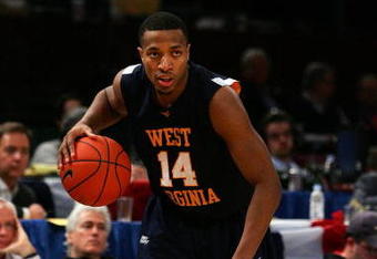 NEW YORK - MARCH 13:  Darris Nichols #14 of the West Virginia Mountaineers handles the ball against the Connecticut Huskies during day two of the 2008 Big East Men's Basketball Championship at Madison Square Garden on March 13, 2008 in New York City.  (Photo by Jim McIsaac/Getty Images)
