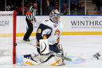 UNIONDALE, NY - OCTOBER 31:  Ryan Miller #30 of the Buffalo Sabres makes a save against the New York Islanders on October 31, 2009 at Nassau Coliseum in Uniondale, New York.  (Photo by Jim McIsaac/Getty Images)