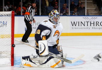UNIONDALE, NY - OCTOBER 31:  Ryan Miller #30 of the Buffalo Sabres makes a save against the New York Islanders on October 31, 2009 at Nassau Coliseum in Uniondale, New York.  (Photo by Jim McIsaac/Getty Images)