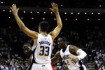 ORLANDO, FL - OCTOBER 28:  Elton Brand #42 of the Philadelphia 76ers looks for an open pass around Ryan Anderson #33 and Mickael Pietrus #20 of the Orlando Magic during the game on October 28, 2009 at Amway Arena in Orlando, Florida.  NOTE TO USER: User expressly acknowledges and agrees that, by downloading and/or using this Photograph, user is consenting to the terms and conditions of the Getty Images License Agreement.  (Photo by Sam Greenwood/Getty Images)
