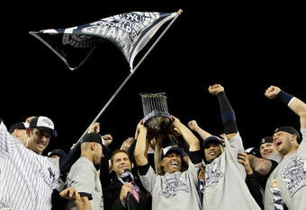 NEW YORK - NOVEMBER 04:  The New York Yankees celebrate after their 7-3 win against the Philadelphia Phillies in Game Six of the 2009 MLB World Series at Yankee Stadium on November 4, 2009 in the Bronx borough of New York City.  (Photo by Pool/Getty Images)