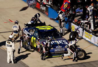 TALLADEGA, AL - NOVEMBER 01: Jimmie Johnson, driver of the #48 Lowe's Chevrolet, pits during the NASCAR Sprint Cup Series AMP Energy 500 at Talladega Superspeedway on November 1, 2009 in Talladega, Alabama.  (Photo by Chris Graythen/Getty Images)