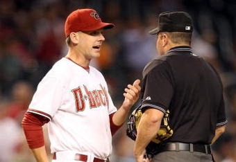 PHOENIX - SEPTEMBER 23:  Manager A.J. Hinch of the Arizona Diamondbacks argues a call with umpire Marty Foster during the major league baseball game against the San Francisco Giants at Chase Field on September 23, 2009 in Phoenix, Arizona.  (Photo by Christian Petersen/Getty Images)