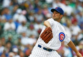 CHICAGO - AUGUST 28: Starting pitcher Ted Lilly #30 of the Chicago Cubs delivers the ball against the New York Mets on August 28, 2009 at Wrigley Field in Chicago, Illinois. The Cubs defeated the Mets 5-2.  (Photo by Jonathan Daniel/Getty Images)