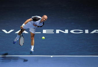 VALENCIA, SPAIN - NOVEMBER 02:  Nikolay Davydenko of Russia serves the ball in his first round match against Alejandro Falla of Colombia during the ATP 500 World Tour Valencia Open tennis tournament at the Ciudad de las Artes y las Ciencias on November 2, 2009 in Valencia, Spain. Davydenko won the match in two sets, 6-2 and 6-1.  (Photo by Jasper Juinen/Getty Images)