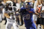 BOISE, ID - SEPTEMBER 3:  Willie Glasper #17 of the Oregon Ducks battles for position with Mitch Burroughs #20 of the Boise State as a pass is thrown in second quarter of the game on September 3, 2009 at Broncos Stadium in Boise, Idaho. Boise State won the game 19-8. (Photo by Steve Dykes/Getty Images)