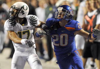 BOISE, ID - SEPTEMBER 3:  Willie Glasper #17 of the Oregon Ducks battles for position with Mitch Burroughs #20 of the Boise State as a pass is thrown in second quarter of the game on September 3, 2009 at Broncos Stadium in Boise, Idaho. Boise State won the game 19-8. (Photo by Steve Dykes/Getty Images)