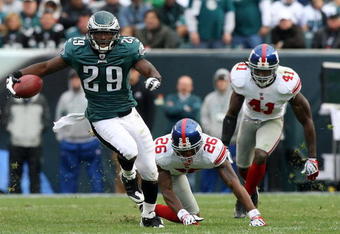 PHILADELPHIA - NOVEMBER 01:  LeSean McCoy #29 of the Philadelphia Eagles eludes the tackle attempt from Aaron Rouse #26 of the New York Giants for a long run to the endzone for a fourth quarter touchdown on November 1, 2009 at Lincoln Financial Field in Philadelphia, Pennsylvania. The Eagles defeated the Giants 40-17.  (Photo by Jim McIsaac/Getty Images)