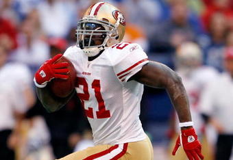 INDIANAPOLIS - NOVEMBER 01:  Frank Gore #21 of the San Francisco 49ers runs for a touchdown during the NFL game against  the Indianapolis Colts  at Lucas Oil Stadium on November 1, 2009 in Indianapolis, Indiana. The Colts won 18-14.  (Photo by Andy Lyons/Getty Images)
