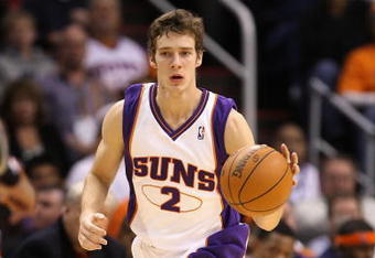 PHOENIX - OCTOBER 30:  Goran Dragic #2 of the Phoenix Suns handles the ball during the NBA game against the Golden State Warriors at US Airways Center on October 30, 2009 in Phoenix, Arizona.  The Suns defeated the Warriors 123-101.   NOTE TO USER: User expressly acknowledges and agrees that, by downloading and or using this photograph, User is consenting to the terms and conditions of the Getty Images License Agreement.  (Photo by Christian Petersen/Getty Images)
