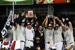NEW YORK - NOVEMBER 04:  (L-R) A.J. Burnett #34, Jorge Posada #20, Derek Jeter #2, Mariano Rivera #42 (holding trophy) Robinson Cano #24 and Nick Swisher #33 of the New York Yankees against the Philadelphia Phillies in Game Six of the 2009 MLB World Series at Yankee Stadium on November 4, 2009 in the Bronx borough of New York City.  (Photo by Chris McGrath/Getty Images)