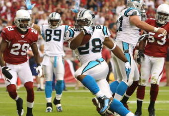 GLENDALE, AZ - NOVEMBER 01:  Running back Jonathan Stewart #28 of the Carolina Panthers scores a 6 yard rushing touchdown past Dominique Rodgers-Cromartie #28 of the Arizona Cardinals during the first quarter of the NFL game at the Universtity of Phoenix Stadium on November 1, 2009 in Glendale, Arizona.  (Photo by Christian Petersen/Getty Images)