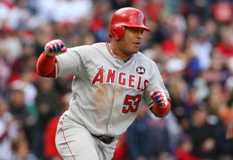 BOSTON - OCTOBER 11:  Bobby Abreu #53 of the Los Angeles Angels of Anaheim reacts after he hits a RBI double in the ninth inning against the Boston Red Sox in Game Three of the ALDS during the 2009 MLB Playoffs at Fenway Park on October 11, 2009 in Boston,  Massachusetts. The Angels defeated the Red Sox 7-6 to advance to the ALCS. (Photo by Jim Rogash/Getty Images)