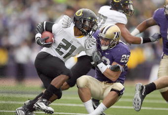SEATTLE - OCTOBER 24:  LaMichael James #21 of the Oregon Ducks carries the ball against Nate Fellner #29 of the Washington Huskies on October 24, 2009 at Husky Stadium in Seattle, Washington. The Ducks defeated the Huskies 43-19. (Photo by Otto Greule Jr/Getty Images)