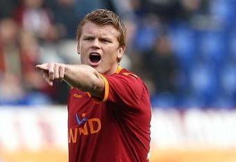 ROME, ITALY - NOVEMBER 01:  John Arne Riise  of AS Roma shouts during the Serie A match between AS Roma and Bologna FC at Stadio Olimpico on November 1, 2009 in Rome, Italy.  (Photo by Paolo Bruno/Getty Images)