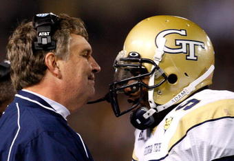 ATLANTA - OCTOBER 17:  Head coach Paul Johnson (L) of the Georgia Tech Yellow Jackets congratulates quarterback Josh Nesbitt #9 after his touchdown against the Virginia Tech Hokies at Bobby Dodd Stadium on October 17, 2009 in Atlanta, Georgia.  (Photo by Kevin C. Cox/Getty Images)