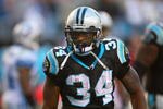 CHARLOTTE, NC - NOVEMBER 16:  DeAngelo Williams #34 of the Carolina Panthers looks on during their NFL game against the Detroit Lions at Bank of America Stadium on November 16, 2008  in Charlotte, North Carolina. The Panthers defeated the Lions 31-22. (Photo by Streeter Lecka/Getty Images)