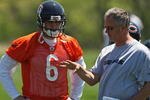 LAKE FOREST, IL - MAY 20:  Jay Cutler #6 of the Chicago Bears and offensive coordinator Ron Turner discuss a play during an organized team activity (OTA) practice on May 20, 2009 at Halas Hall in Lake Forest, Illinois.  (Photo by Jonathan Daniel/Getty Images)