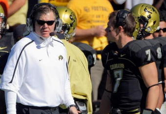 BOULDER, CO - OCTOBER 31:  Head coach Dan Hawkins of the Colorado Buffaloes leads his team against the Missouri Tigers with his son Cody Hawkins #7 on the sidelines at Folsom Field on October 31, 2009 in Boulder, Colorado. Missouri defeated Colorado 36-17.  (Photo by Doug Pensinger/Getty Images)