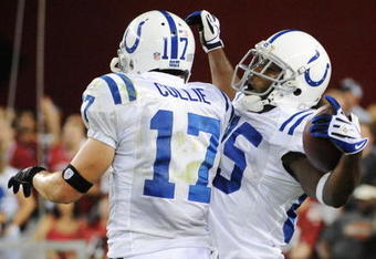 GLENDALE, AZ - SEPTEMBER 27: Wide receiver Pierre Garcon #85 of the Indianapolis Colts reacts with teammate Austin Collie #17 after Garcon makes a 53-yard touchdown catch against the Arizona Cardinals in the second quarter during the game at University of Phoenix Stadium on September 27, 2009 in Glendale, Arizona.  (Photo by Harry How/Getty Images)