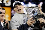 NEW YORK - NOVEMBER 04:  Manager Joe Girardi #27 of the New York Yankees celebrate after their 7-3 win against the Philadelphia Phillies in Game Six of the 2009 MLB World Series at Yankee Stadium on November 4, 2009 in the Bronx borough of New York City.  (Photo by Pool/Getty Images)