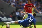 LONDON, ENGLAND - AUGUST 09:  Ji-Sung Park of Manchester United takes on John Terry of Chelsea during the FA Community Shield match between Manchester United and Chelsea at Wembley Stadium on August 9, 2009 in London, England.  (Photo by Jamie McDonald/Getty Images)