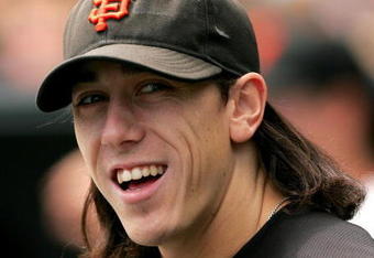 SAN FRANCISCO - AUGUST 30:  Tim Lincecum #55 of the San Francisco Giants stands in the dugout before their game against the Colorado Rockies at AT&T Park on August 30, 2009 in San Francisco, California.  (Photo by Ezra Shaw/Getty Images)