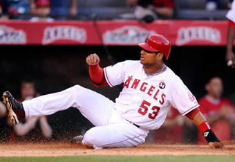 ANAHEIM, CA - OCTOBER 22:  Bobby Abreu #53 of the Los Angeles Angels of Anaheim scores in the first inning in Game Five of the ALCS against the New York Yankees during the 2009 MLB Playoffs at Angel Stadium on October 22, 2009 in Anaheim, California.  (Photo by Kevork Djansezian/Getty Images)