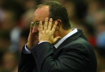 LIVERPOOL, ENGLAND - AUGUST 19:  Liverpool Manager Rafael Benitez watches the action from the touchline during the Barclays Premier League match between Liverpool and Stoke City at Anfield on August 19, 2009 in Liverpool, England.  (Photo by Clive Brunskill/Getty Images)
