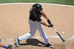 CHICAGO - JUNE 28: Jermaine Dye #23 of the Chicago White Sox hits the ball against the Chicago Cubs on June 28, 2009 at U.S. Cellular Field in Chicago, Illinois. The White Sox defeated the Cubs 6-0. (Photo by Jonathan Daniel/Getty Images) 