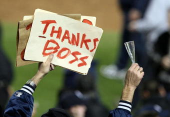 NEW YORK - NOVEMBER 04:  Fans of the New York Yankees celebrate their 7-3 win against the Philadelphia Phillies in Game Six of the 2009 MLB World Series at Yankee Stadium on November 4, 2009 in the Bronx borough of New York City.  (Photo by Al Bello/Getty Images)