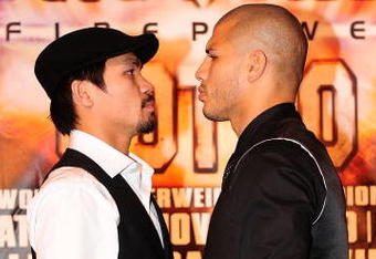 BEVERLY HILLS, CA - SEPTEMBER 14:  Manny Pacquiao and  Miguel Cotto pose for pictures during the press conference at the Beverly Hills Hotel on September 14, 2009 in Beverly Hills, California.  (Photo by Jacob de Golish/Getty Images)
