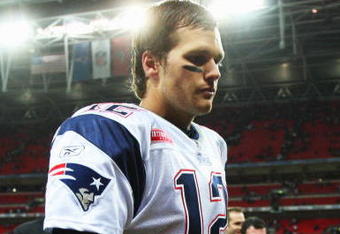 LONDON, ENGLAND - OCTOBER 25:  Tom Brady (#12) of the New England Patriots leaves the field of play during the NFL International Series match between New England Patriots and Tampa Bay Buccaneers at Wembley Stadium on October 25, 2009 in London, England. This is the third occasion where a regular season NFL match has been played in London.  (Photo by Tom Shaw/Getty Images)