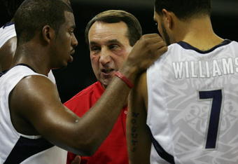 MACAU, CHINA - AUGUST 01:  Head coach Mike Krzyzewski talks with Chris Paul #13 and Deron Williams #7 of the USA Basketball Men's Senior National Team during the USA Basketball International Challenge exhibition game against the Turkey National Team at the Coati Strip Cotai Arena August 1, 2008 in Macau, China.  (Photo by MN Chan/Getty Images)