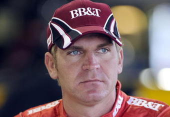 MARTINSVILLE, VA - OCTOBER 23:  Clint Bowyer, driver of the #33 BB&T Chevrolet, sits in the garage before the start of practice for the NASCAR Sprint Cup Series TUMS Fast Relief 500 at Martinsville Speedway on October 23, 2009 in Martinsville, Virginia.  (Photo by John Harrelson/Getty Images)