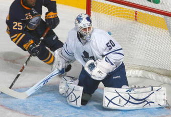 BUFFALO, NY - OCTOBER 30:  Goalie Jonas Gustavsson #50 of the Toronto Maple Leafs guards the net against Michael Grier #25 of the Buffalo Sabres at HSBC Arena on October 30, 2009 in Buffalo, New York. (Photo by Rick Stewart/Getty Images)
