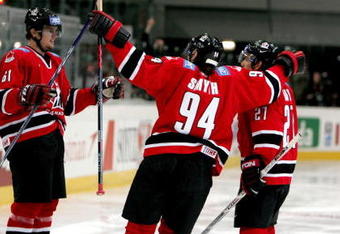 INNSBRUCK, AUSTRIA - MAY 05:  Rick Nash #61 of Canada celebrates his goal with teammates Ryan Smyth #94 and Dan Boyle #27 in the second period against the USA in the IIHF World Men's Championships preliminary round game at the Olympic Hall on May 5, 2005 in Innsbruck, Austria.  (Photo by Jeff Gross/Getty Images)