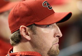 PHOENIX - APRIL 10:  Pitcher Brandon Webb #17 of the Arizona Diamondbacks looks on during the game  against the Los Angeles Dodgers at Chase Field on April 10, 2009 in Phoenix, Arizona. The Diamondbacks defeated the Dodgers 9-4.  (Photo by Christian Petersen/Getty Images)