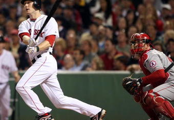 BOSTON - SEPTEMBER 15:  Jason Bay #44 of the Boston Red Sox gets a hit against the Los Angeles Angels of Anaheim on September 15, 2009 at Fenway Park in Boston, Massachusetts. The Red Sox defeated the Rays 3-1.  (Photo by Elsa/Getty Images)
