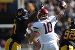 BERKELEY, CA - OCTOBER 24:  Jeff Tuel #10 of the Washington State Cougars passes against Cameron Jordan #97 of the California Golden Bears at California Memorial Stadium on October 24, 2009 in Berkeley, California.  (Photo by Jed Jacobsohn/Getty Images)