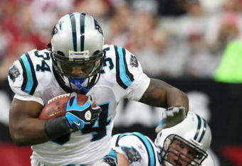 GLENDALE, AZ - NOVEMBER 01:  Runningback DeAngelo Williams #34 of the Carolina Panthers rushes the ball against the Arizona Cardinals during the NFL game at the Universtity of Phoenix Stadium on November 1, 2009 in Glendale, Arizona. The Panthers defeated the Cardinals 34-21.  (Photo by Christian Petersen/Getty Images)