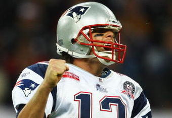 LONDON, ENGLAND - OCTOBER 25:  Tom Brady (#12) of the New England Patriots celebrates during the NFL International Series match between New England Patriots and Tampa Bay Buccaneers at Wembley Stadium on October 25, 2009 in London, England. This is the third occasion where a regular season NFL match has been played in London.  (Photo by Julian Finney/Getty Images)
