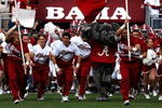 TUSCALOOSA, AL - OCTOBER 24:  The cheerleaders of the Alabama Crimson Tide lead the team onto the field to face the Tennessee Volunteers at Bryant-Denny Stadium on October 24, 2009 in Tuscaloosa, Alabama.  (Photo by Kevin C. Cox/Getty Images)