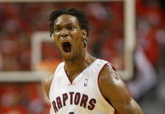 TORONTO,ON - APRIL 24:  Chris Bosh #4 of the Toronto Raptors shows his excitement against the Orlando Magic in Game 3 of the Eastern Conference Quarterfinals on April 24, 2008 at the Air Canada Centre in Toronto, Ontario. The Raptors defeated the Magic 108-94. (Photo by Claus Andersen/Getty Images)