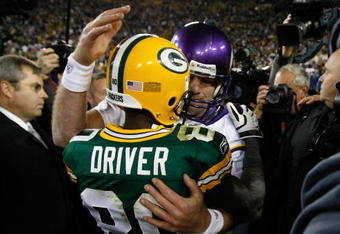 GREEN BAY, WI - NOVEMBER 1: Quarterback Brett Favre #4 of the Minnesota Vikings hugs a Donald Driver #80 of the Green Bay Packers at Lambeau Field on November 1, 2009 in Green Bay, Wisconsin. The Vikings defeated the Packers 38-26. (Photo by Scott Boehm/Getty Images)