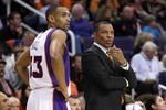 PHOENIX - OCTOBER 30:  Head coach Alvin Gentry and Grant Hill #3 of the Phoenix Suns during the NBA game against the Golden State Warriors at US Airways Center on October 30, 2009 in Phoenix, Arizona. The Suns defeated the Warriors 123-101. NOTE TO USER: User expressly acknowledges and agrees that, by downloading and or using this photograph, User is consenting to the terms and conditions of the Getty Images License Agreement.  (Photo by Christian Petersen/Getty Images)