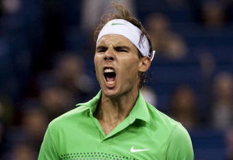 SHANGHAI, CHINA - OCTOBER 14: Rafael Nadal of Spain celebrates after winning his match against James Blake of the United States during day four of 2009 Shanghai ATP Masters 1000 at the Qi Zhong Tennis Centre on October 14, 2009 in Shanghai, China.   (Photo by Victor Fraile/Getty Images)